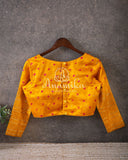 Yellow pure silk blouse with bandini and chikankari on sleeve edge