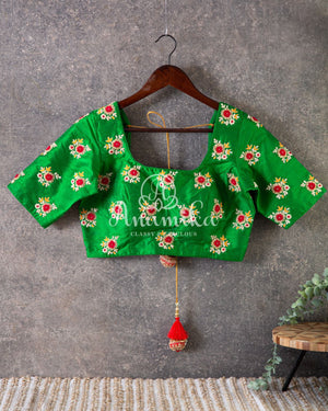 Green blouse with all over thread work buttis