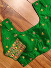 Green blouse with multi color threadwork