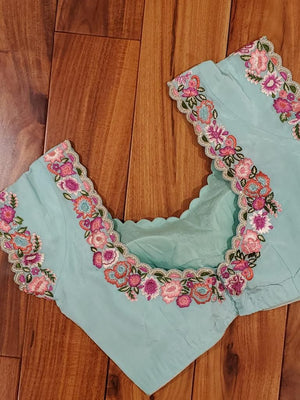 Pastel blue crepe blouse with intricate thread work