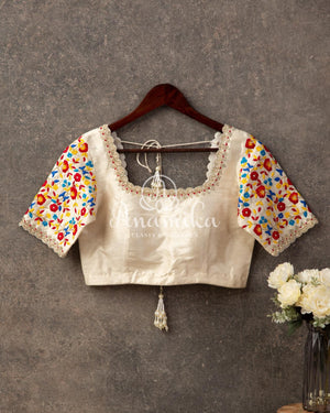 Offwhite blouse with multi color threadwork
