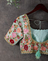Pastel blue pure silk blouse with intricate multi color floral thread work