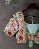 Pastel blue pure silk blouse with intricate multi color floral thread work
