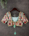 Pastel blue pure silk blouse with intricate multi color floral thread work