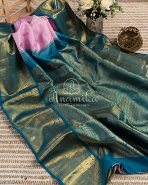 Pastel Pink Kanchipattu saree with contrast teal blue border