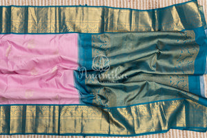Pastel Pink Kanchipattu saree with contrast teal blue border
