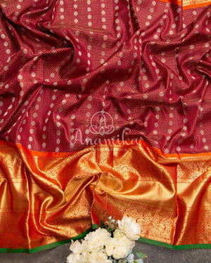 Brown Gadwal saree with grand kanchi pattu border in orange