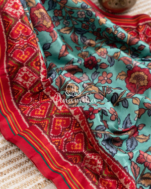 Blue Kalamkari Digital Print on crepe silk with a beautifully designed red blouse