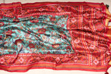 Blue Kalamkari Digital Print on crepe silk with a beautifully designed red blouse