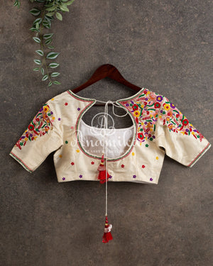 Off white blouse with beautiful thread embroidery on sleeves and shoulder