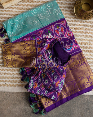 Teal Blue Twill Ikkat Saree with purple kanchi and patola borders