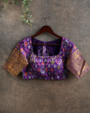 Teal Blue Twill Ikkat Saree with purple kanchi and patola borders