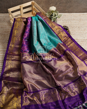 Teal Blue Twill Ikkat Saree with purple kanchi and patola borders