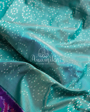 Teal Blue Twill Ikkat Saree with purple kanchi and patola borders