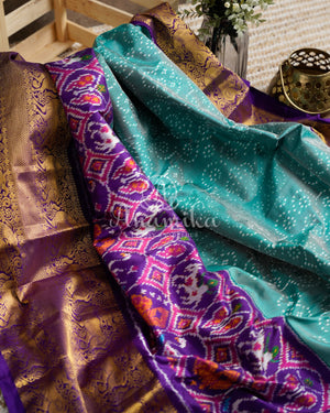 Teal Blue Twill Ikkat Saree with purple kanchi and patola borders