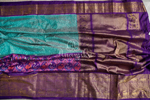 Teal Blue Twill Ikkat Saree with purple kanchi and patola borders