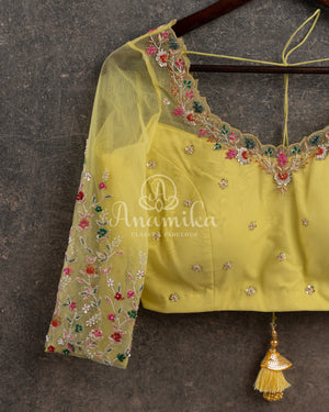 Lemon Yellow Floral Georgette Sequins saree with beautiful net sleeves blouse