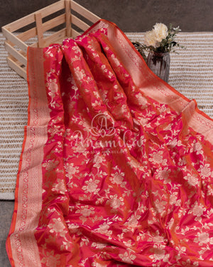 Tomato Pink banarasi silk saree with contrast purple work blouse