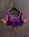 Tomato Pink banarasi silk saree with contrast purple work blouse