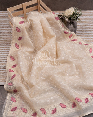 Porcelain White Organza saree with all over chikankari work and a stunning designer blouse