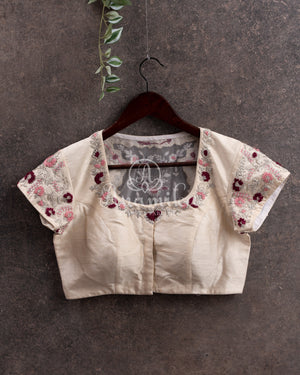 Porcelain White Organza saree with all over chikankari work and a stunning designer blouse