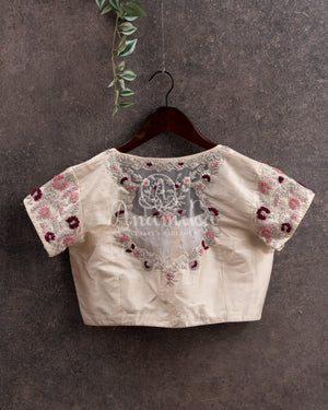 Porcelain White Organza saree with all over chikankari work and a stunning designer blouse