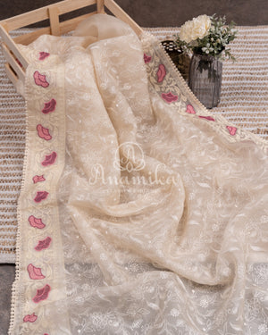Porcelain White Organza saree with all over chikankari work and a stunning designer blouse