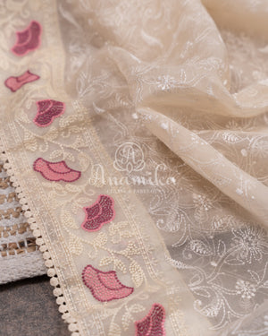 Porcelain White Organza saree with all over chikankari work and a stunning designer blouse