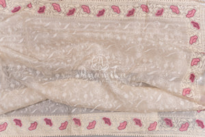 Porcelain White Organza saree with all over chikankari work and a stunning designer blouse