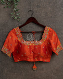 Orange color blouse with multi color thread and zardosi work