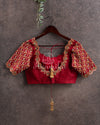 Maroonish Red color blouse with gold zarodis embroidery