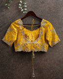 Lovely Yellow color blouse with silver zardosi floral work