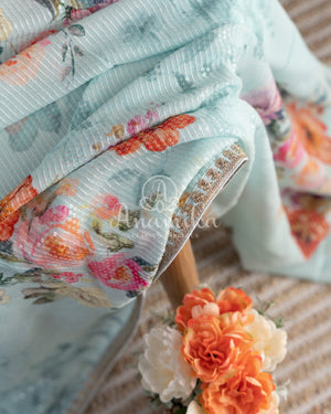 Pastel Blue Floral Georgette Sequins saree with beautiful net sleeves blouse