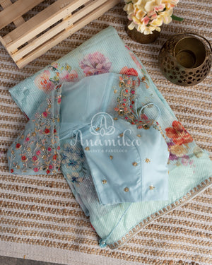 Pastel Blue Floral Georgette Sequins saree with beautiful net sleeves blouse