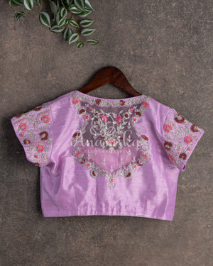 Lovely Lavender Organza saree with all over chikankari work and a stunning designer blouse