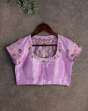 Lovely Lavender Organza saree with all over chikankari work and a stunning designer blouse