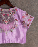 Lovely Lavender Organza saree with all over chikankari work and a stunning designer blouse