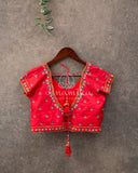 Red short sleeves blouse with cutdana and thread work