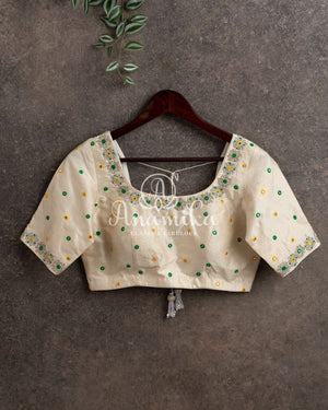 Off white blouse with silver zardosi and mirror work