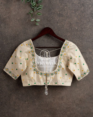 Off white blouse with silver zardosi and mirror work