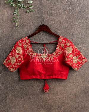 Red heavy work blouse with intricately designed zardosi work