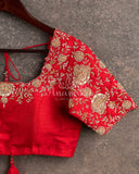 Red heavy work blouse with intricately designed zardosi work