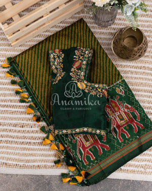 Hues of Green Ikkat saree with a patola border