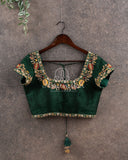 Hues of Green Ikkat saree with a patola border