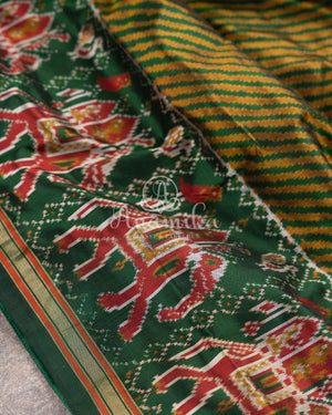 Hues of Green Ikkat saree with a patola border