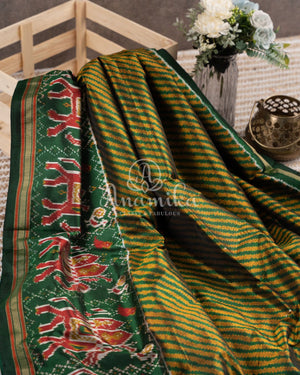 Hues of Green Ikkat saree with a patola border