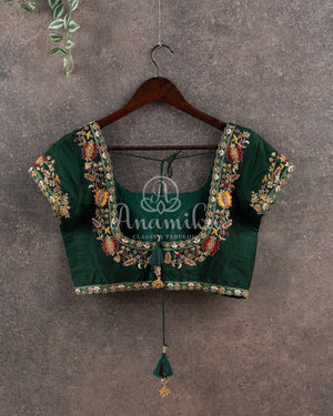 Hues of Green Ikkat saree with a patola border