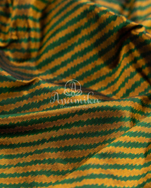 Hues of Green Ikkat saree with a patola border