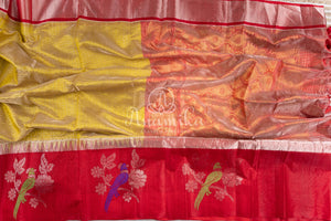 Beautiful Golden Tissue Kuppadam saree with contrast red border