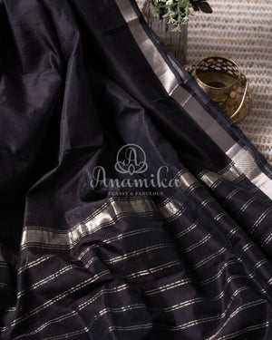 Black Mangalagiri Silk saree with a contrast pure silk yellow floral blouse